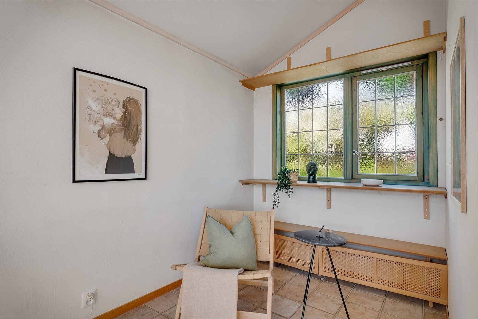 En lys krok i tilknytning til stuen. Galleribilde