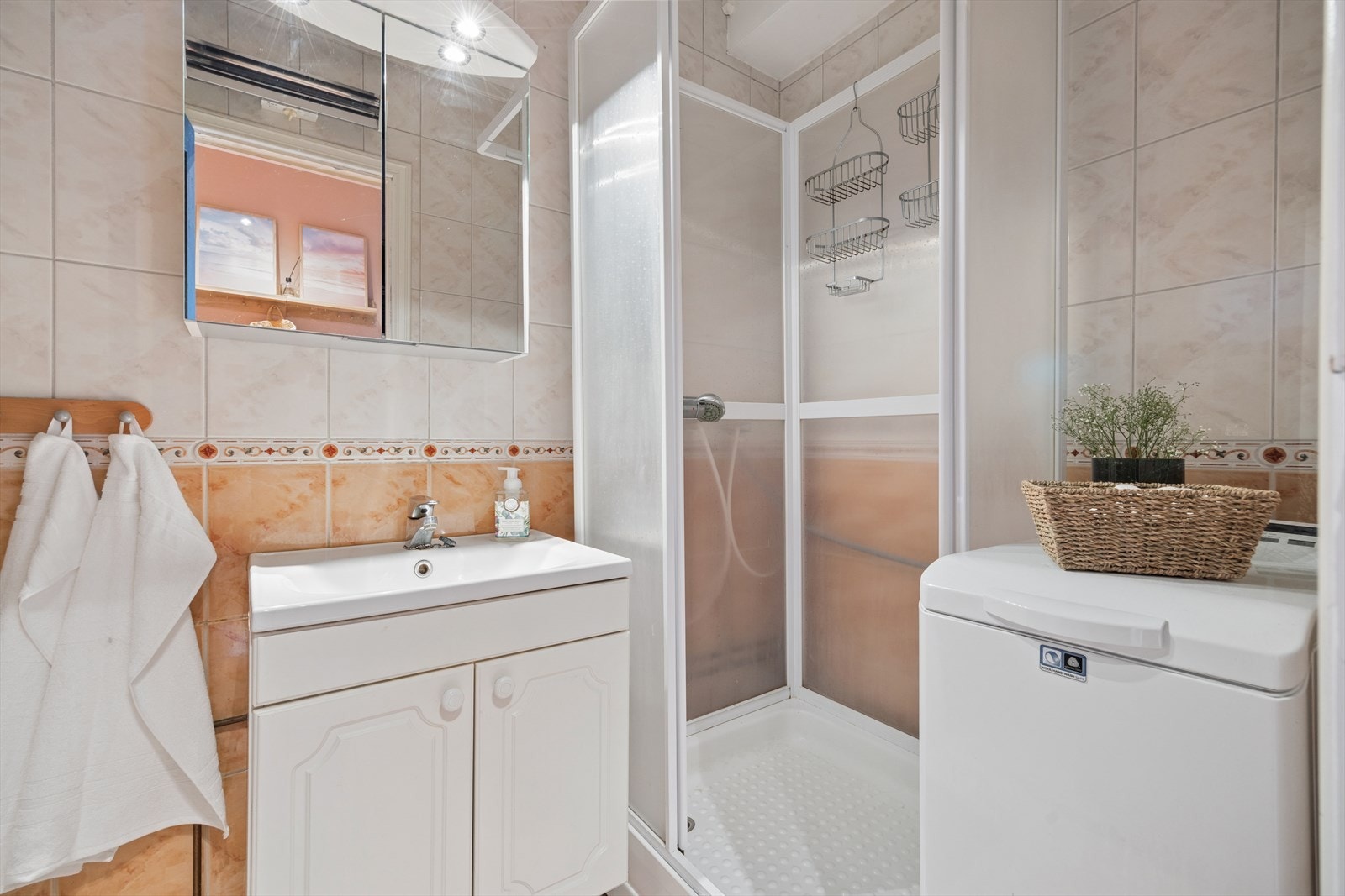 Badet har opplegg for vaskemaskin. Galleribilde