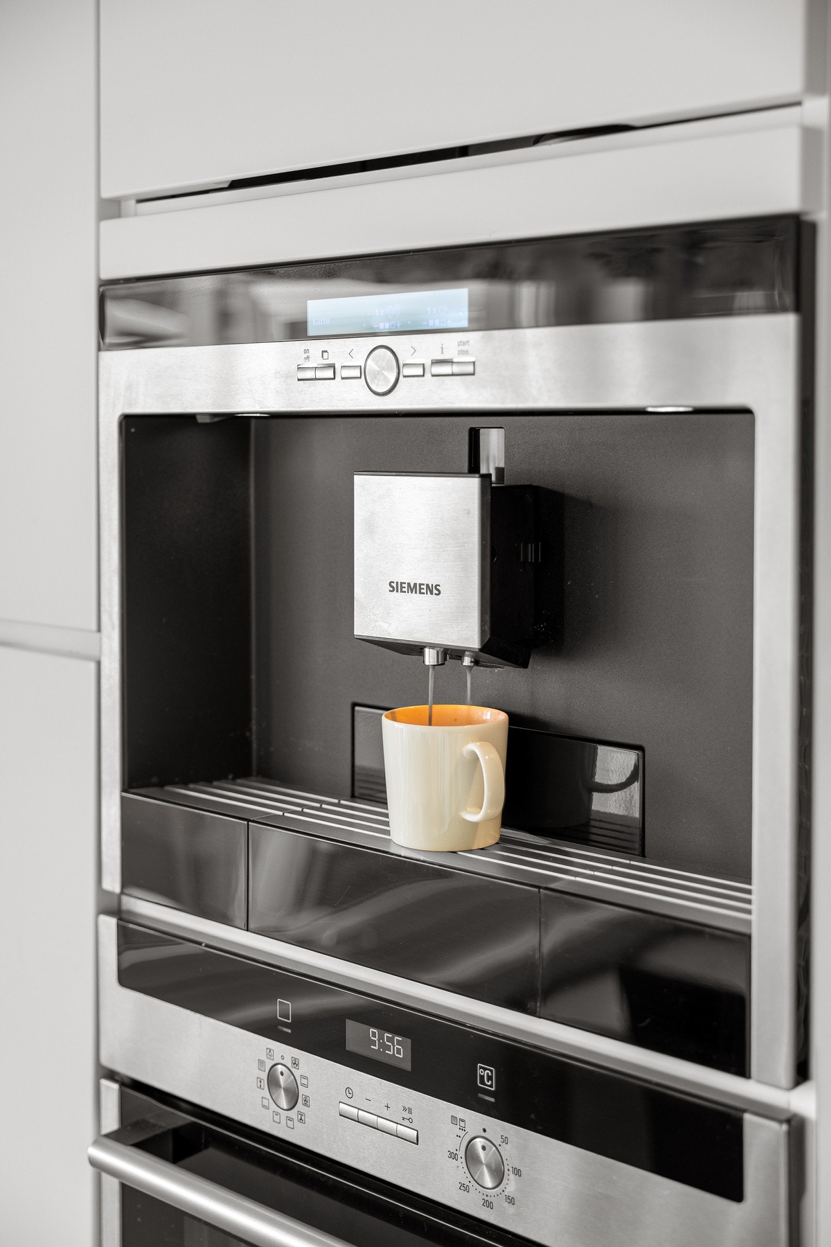 Integrert kaffemaskin er både stilig og luksus! Galleribilde