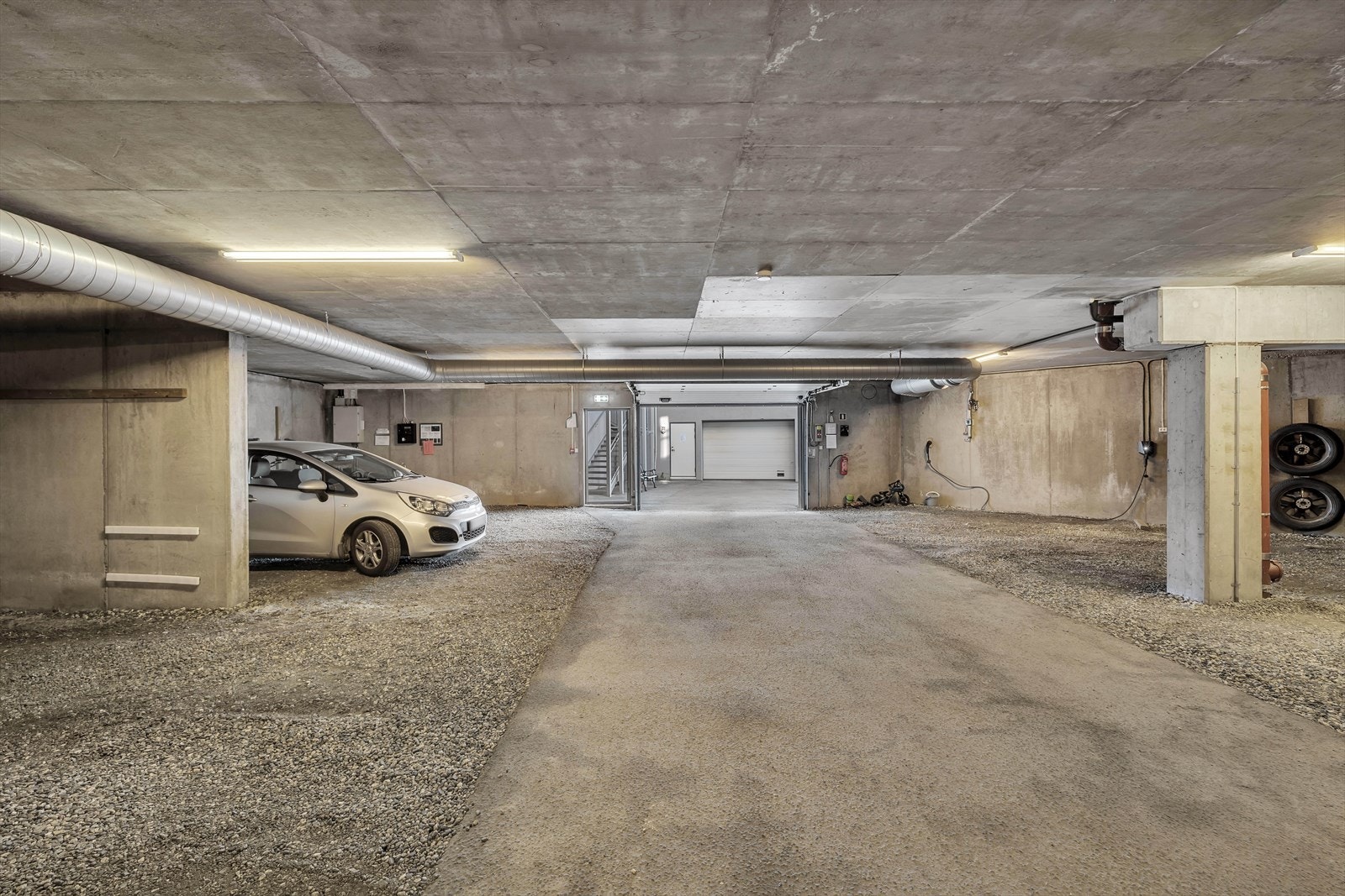 Det medfølger fast parkering med elbillader i felles garasjeanlegg. Galleribilde