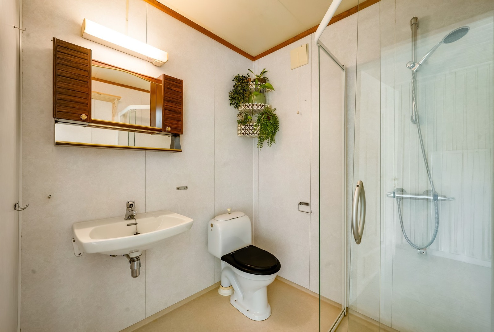 Badet er plassert mellom spisestue og stue. Galleribilde