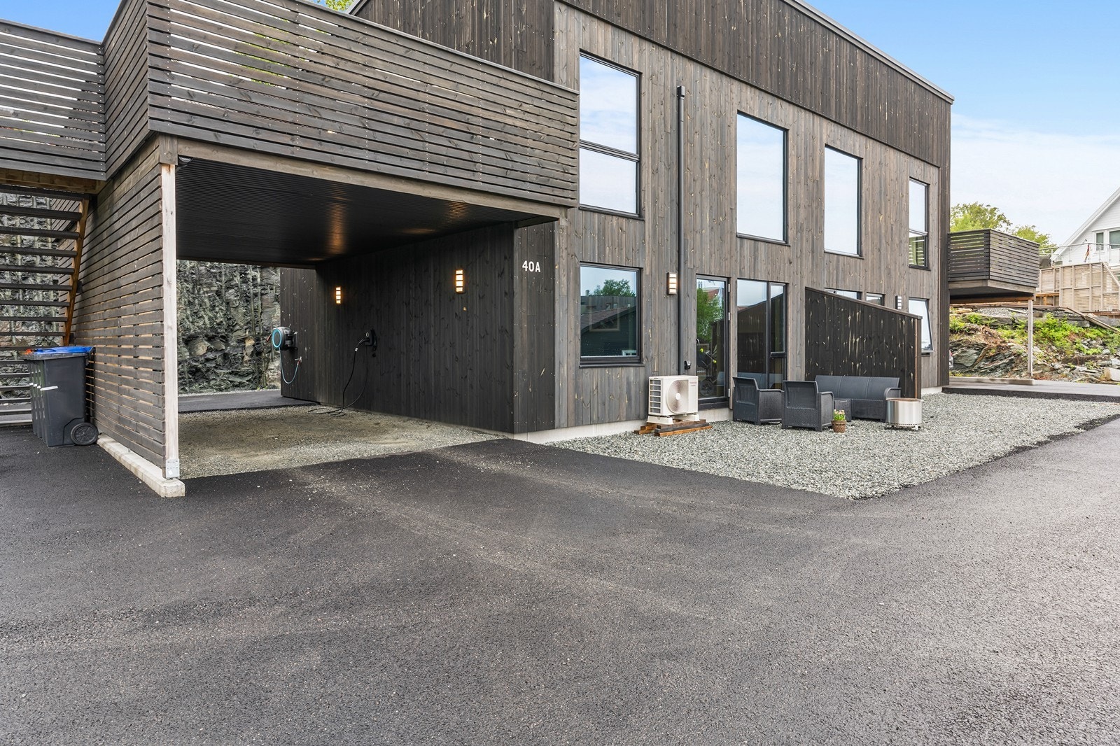 Carporten gir praktisk parkering Galleribilde