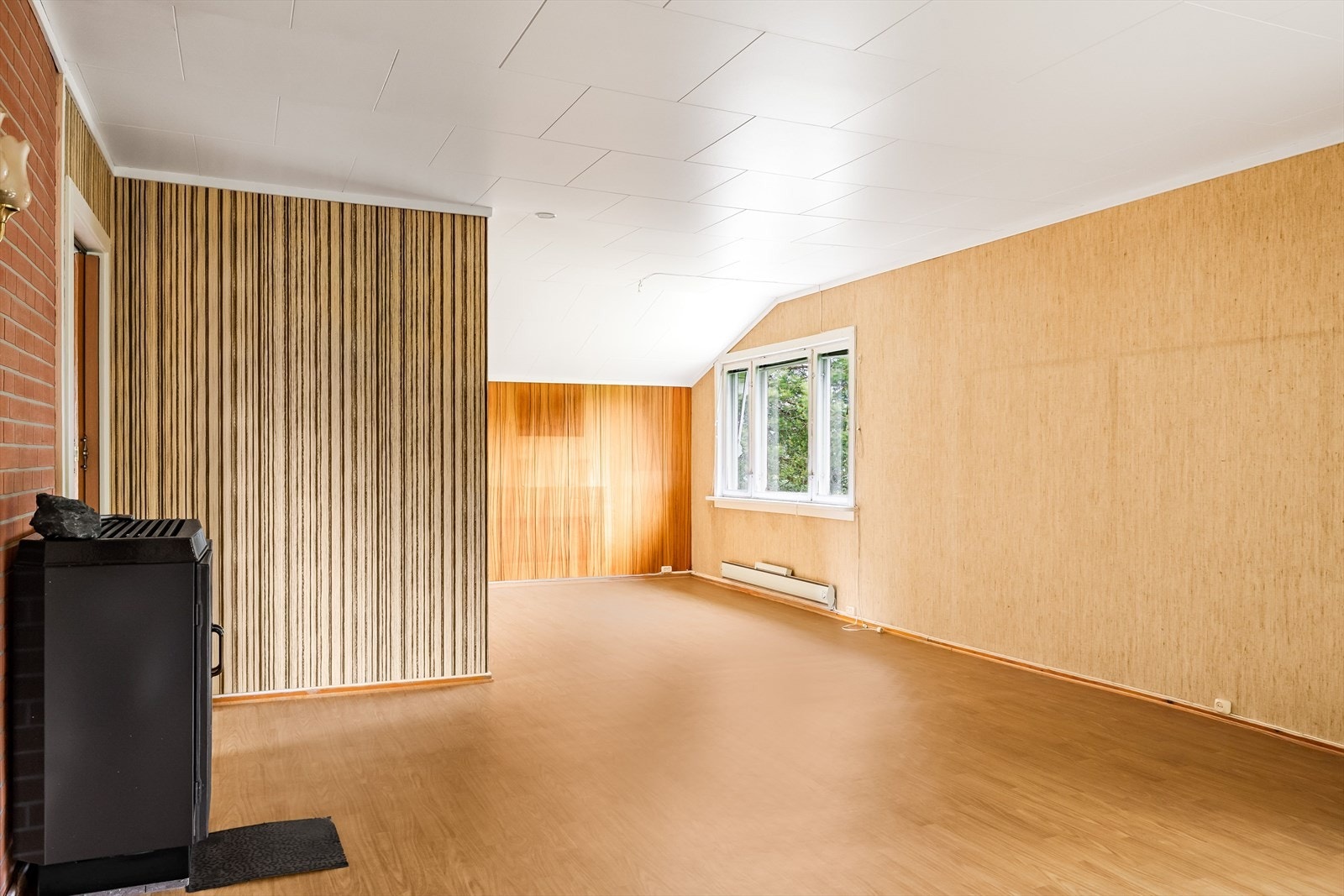 I 2. etasje er det en romslig stue med flere muligheter. Galleribilde