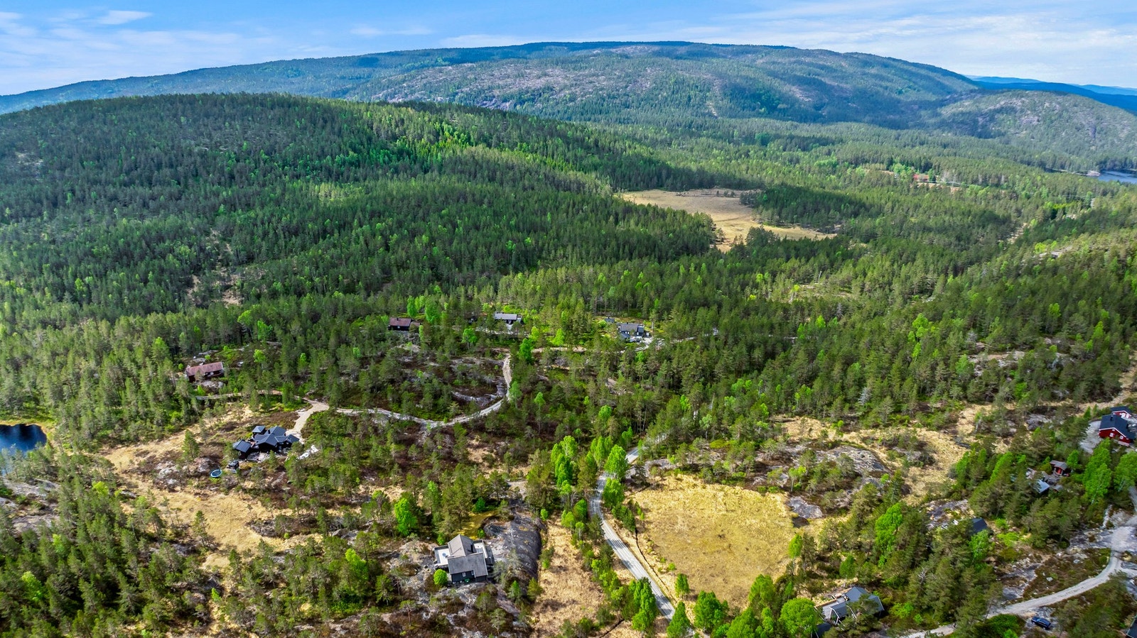 Oversiktsbilde fra hyttefeltet med festetomter og utviklingsmuligheter Galleribilde
