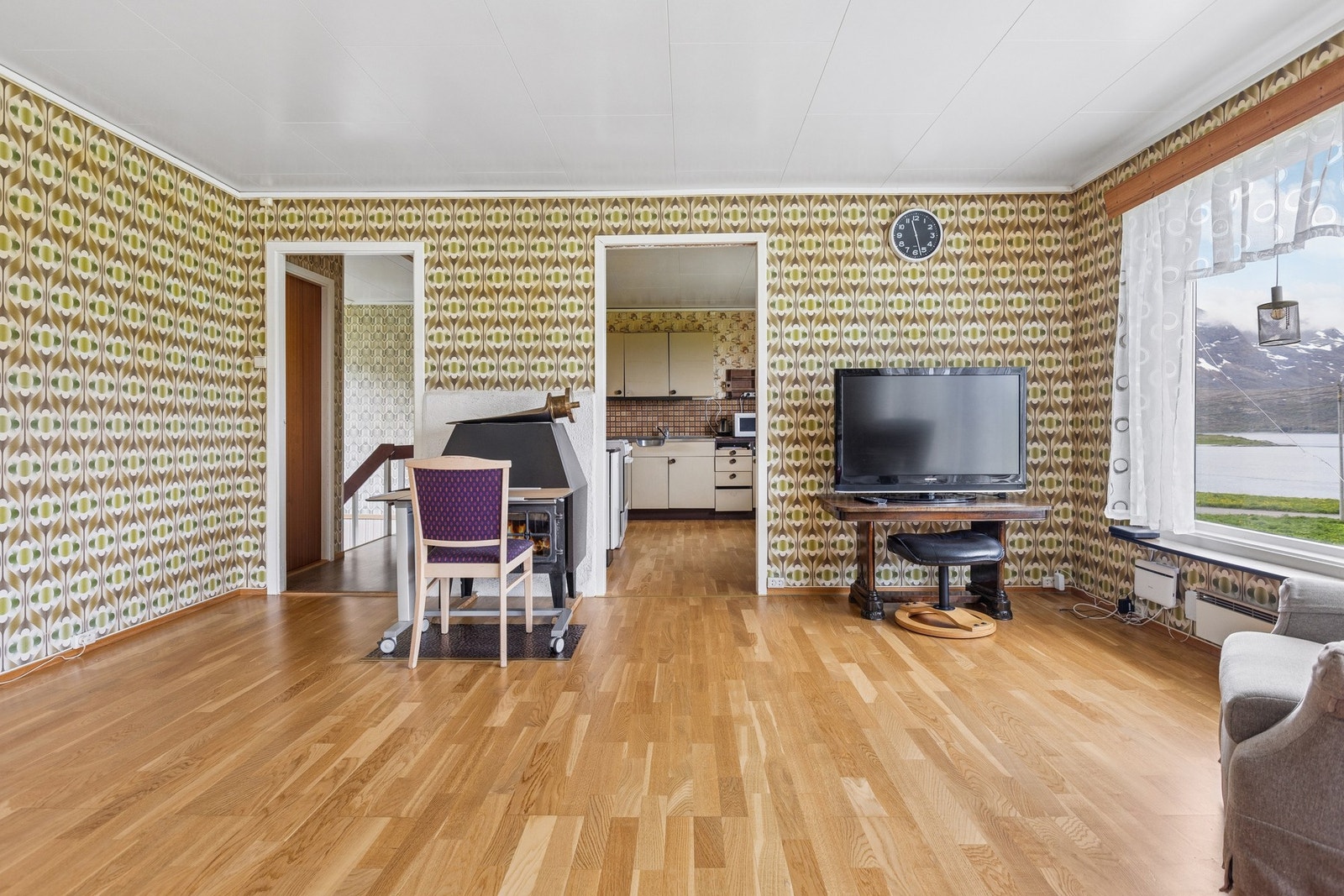 Vedovnen i stuen gir en lun varme på kalde dager. Galleribilde