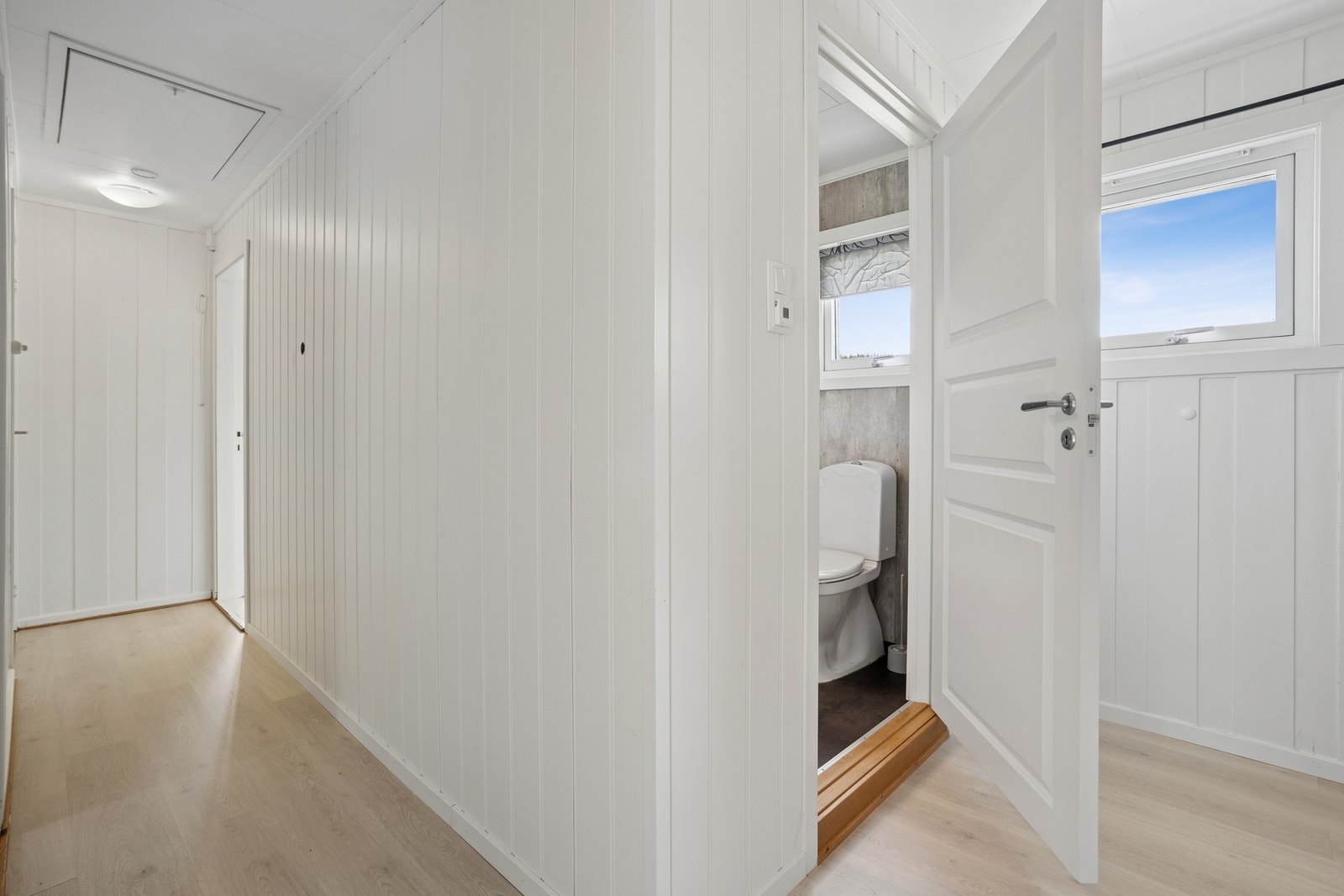 Gangen i andre etasje binder sammen soverommene og badet. Galleribilde