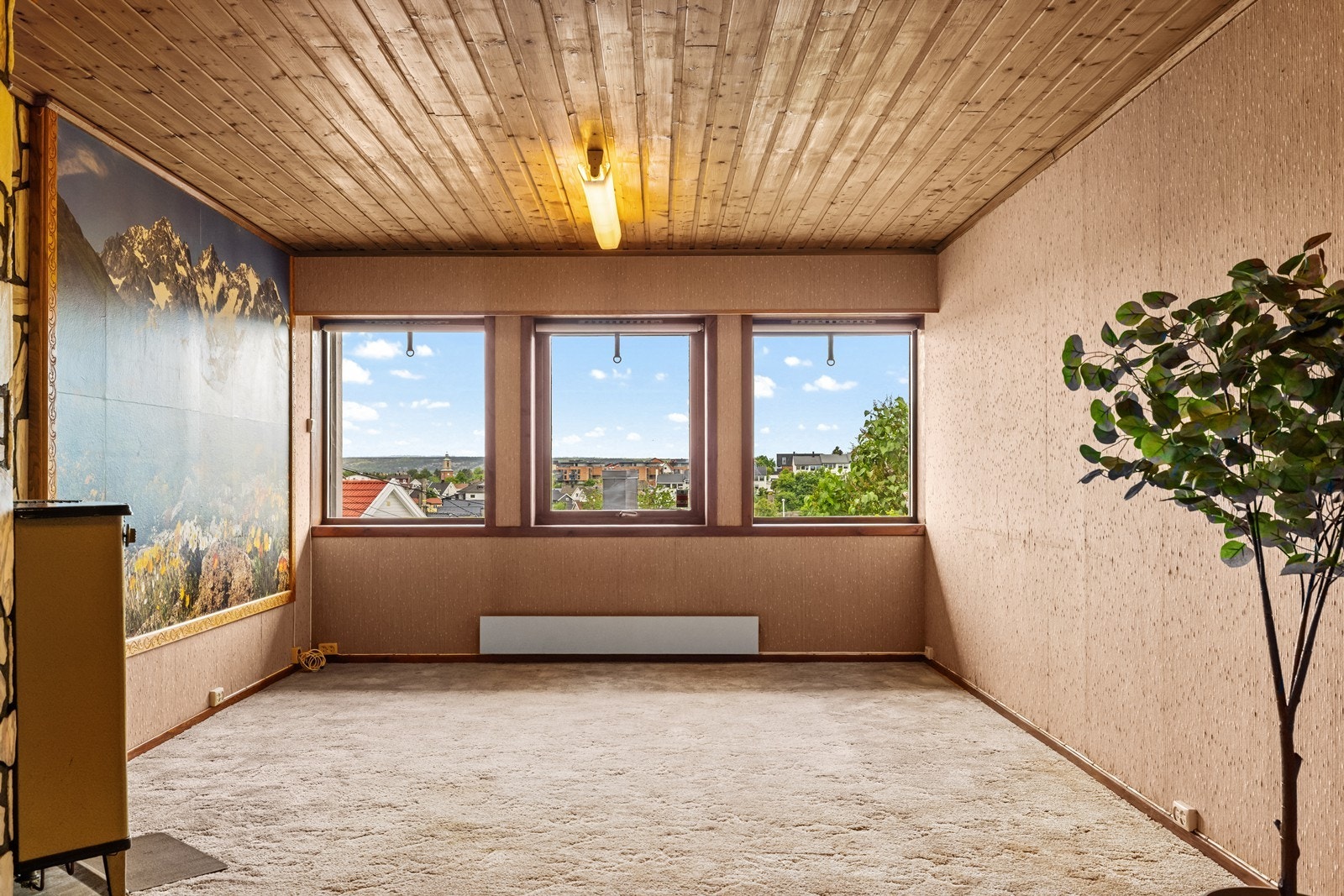 Stuen i underetasjen gir ekstra rom og fleksibilitet for familien. Galleribilde