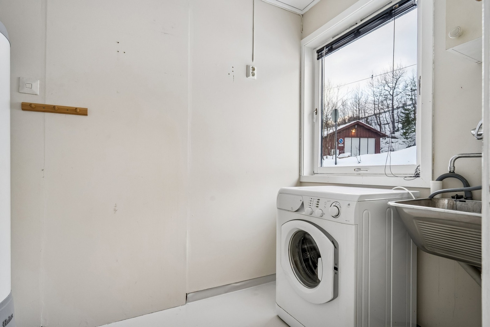 Vaskerommet har en praktisk plassering i leiligheten. Galleribilde