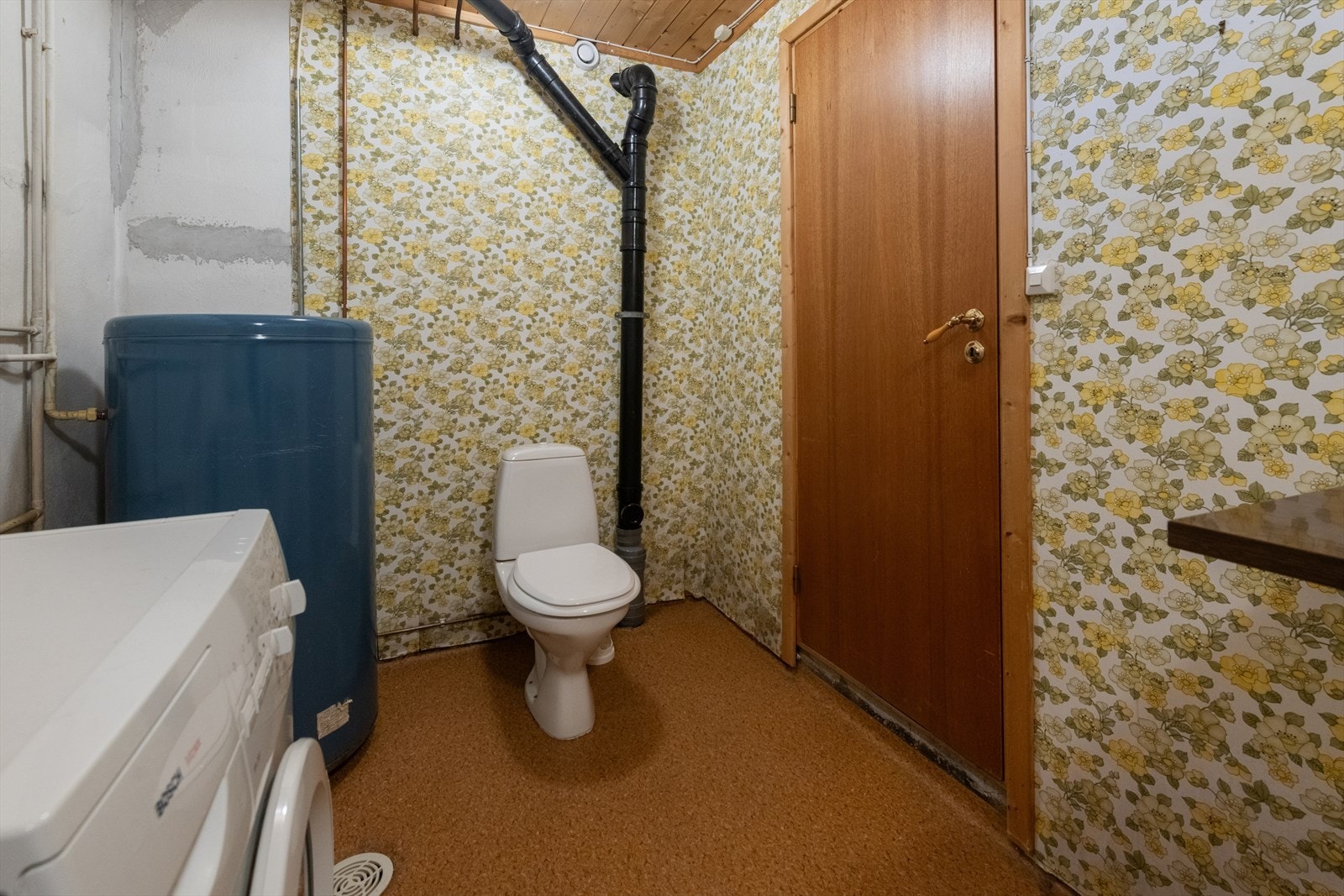 Det er installert toalett på vaskerommet. Galleribilde