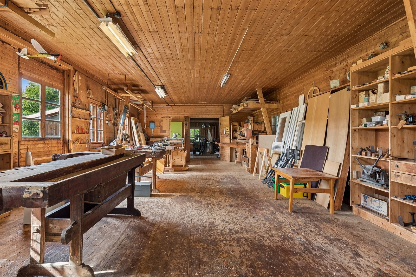 Det tidligere snekkerverkstedet er et stort og allsidig rom, i dag benyttet til lagring. Galleribilde