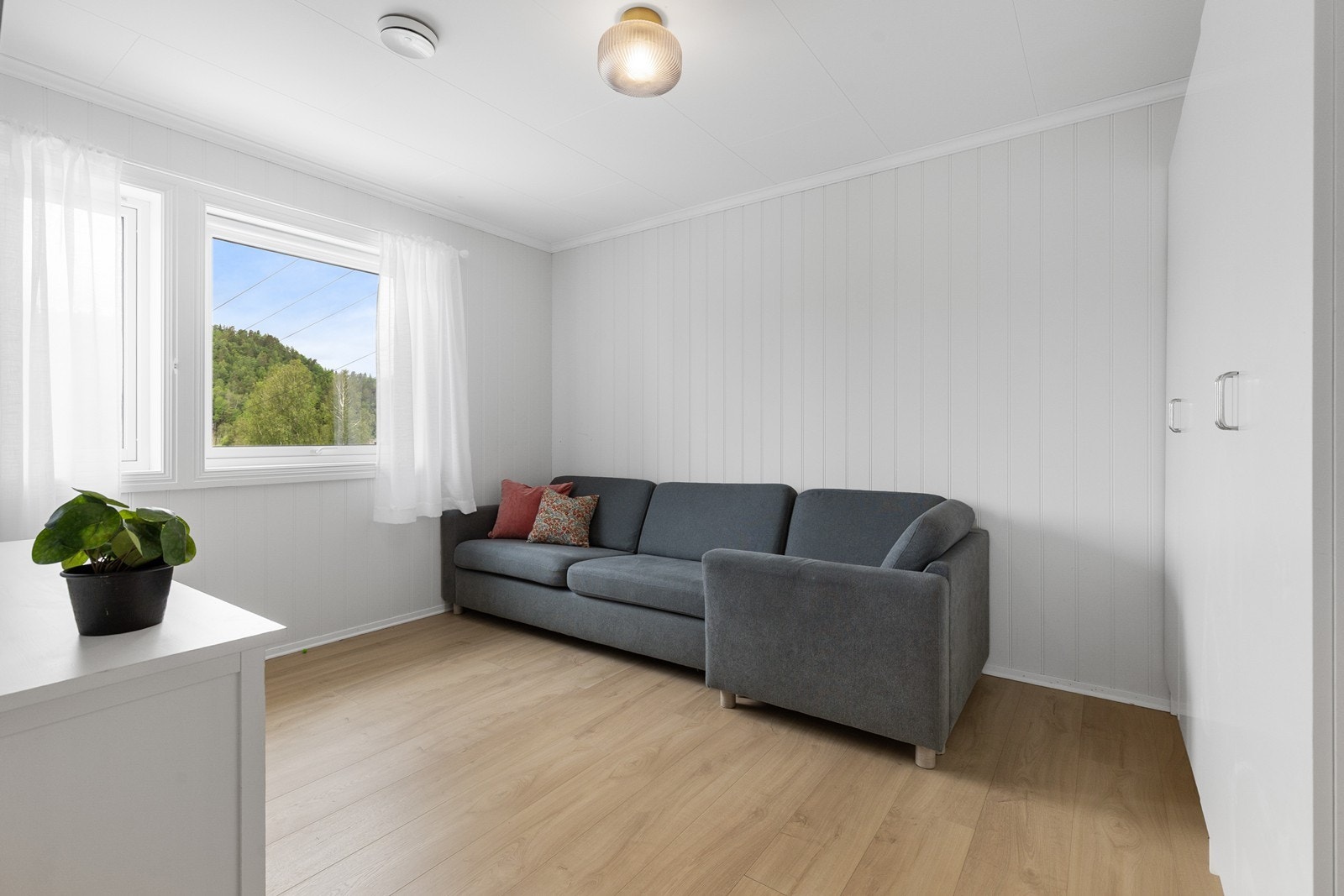 En ekstra stue er perfekt for småbarnsfamilien, eller for den som ønsker en fotballstue til sommerens VM. Galleribilde