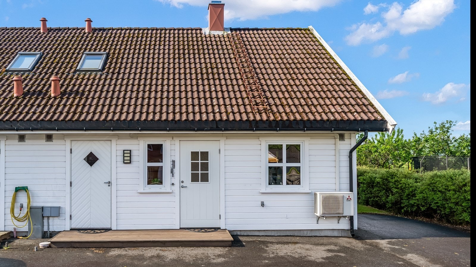Asfaltert adkomst. Galleribilde