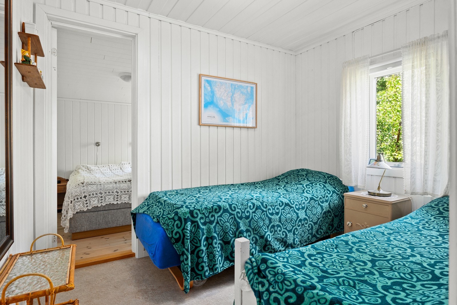 Et lyst og trivelig rom med plass til to enkeltsenger. Galleribilde