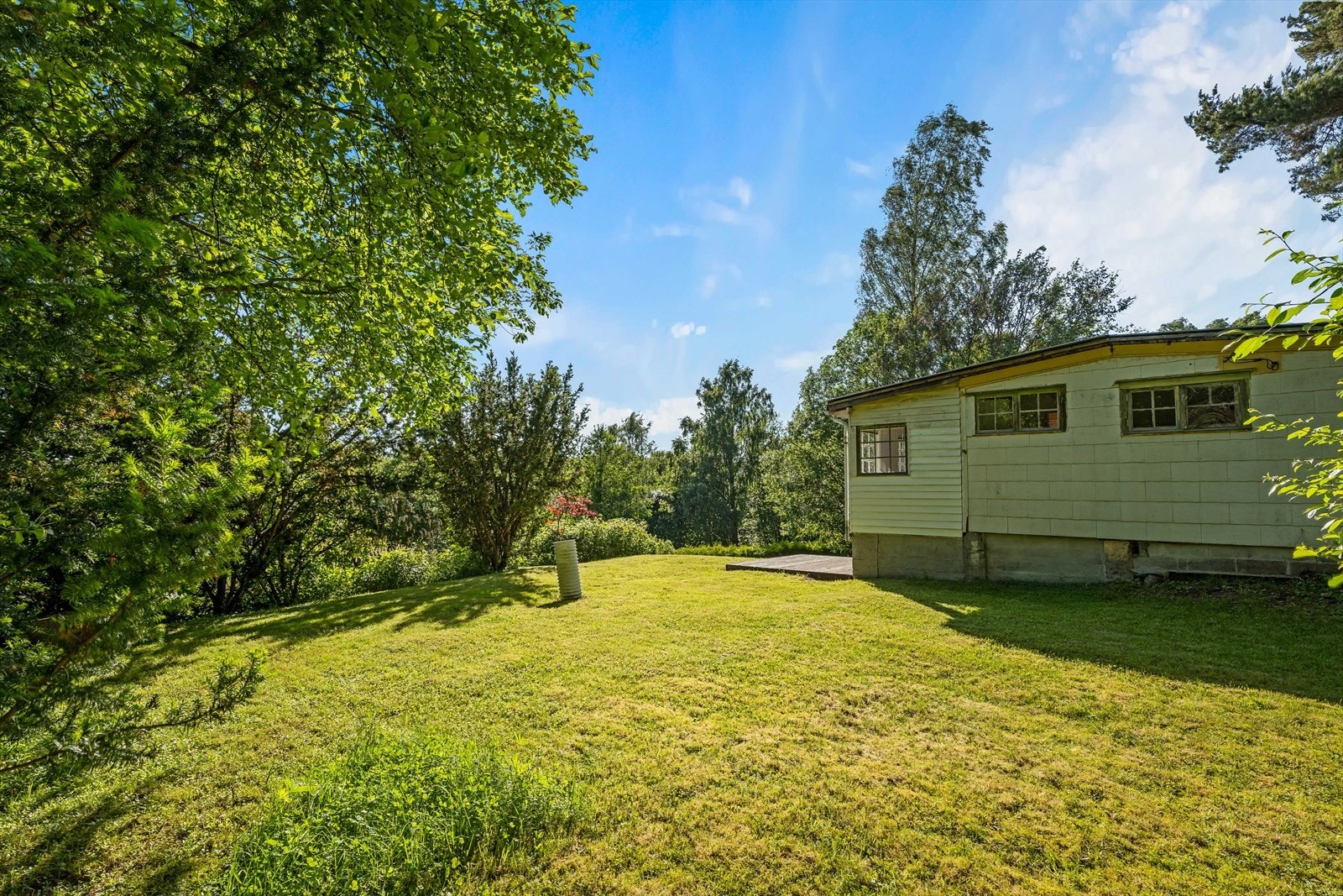 Eiendommen gir en følelse av å være for seg selv, med skogen som nærmeste nabo. Galleribilde