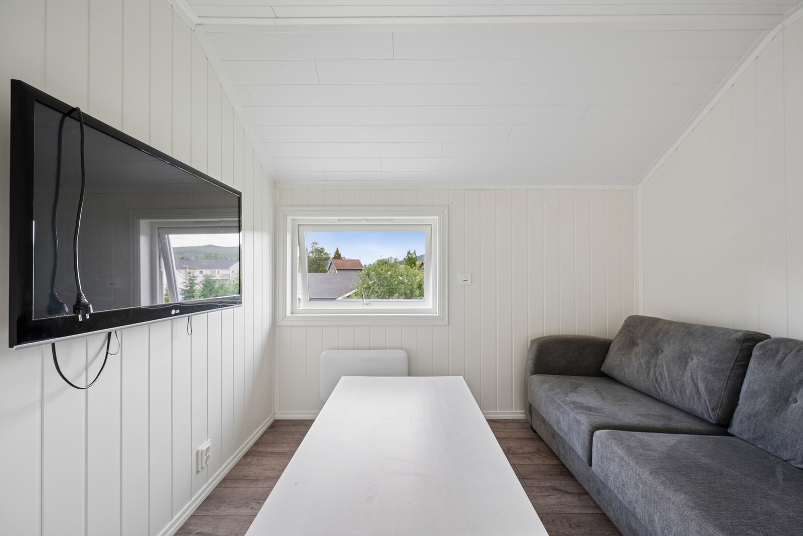 En praktisk loftstue gir ekstra plass, ideell som TV-krok eller lekeareal for barna, eller et siste soverom. Galleribilde