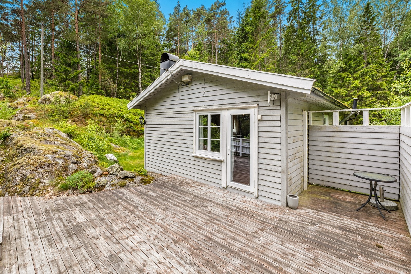 Solrik terrasse med utgang fra stue Galleribilde