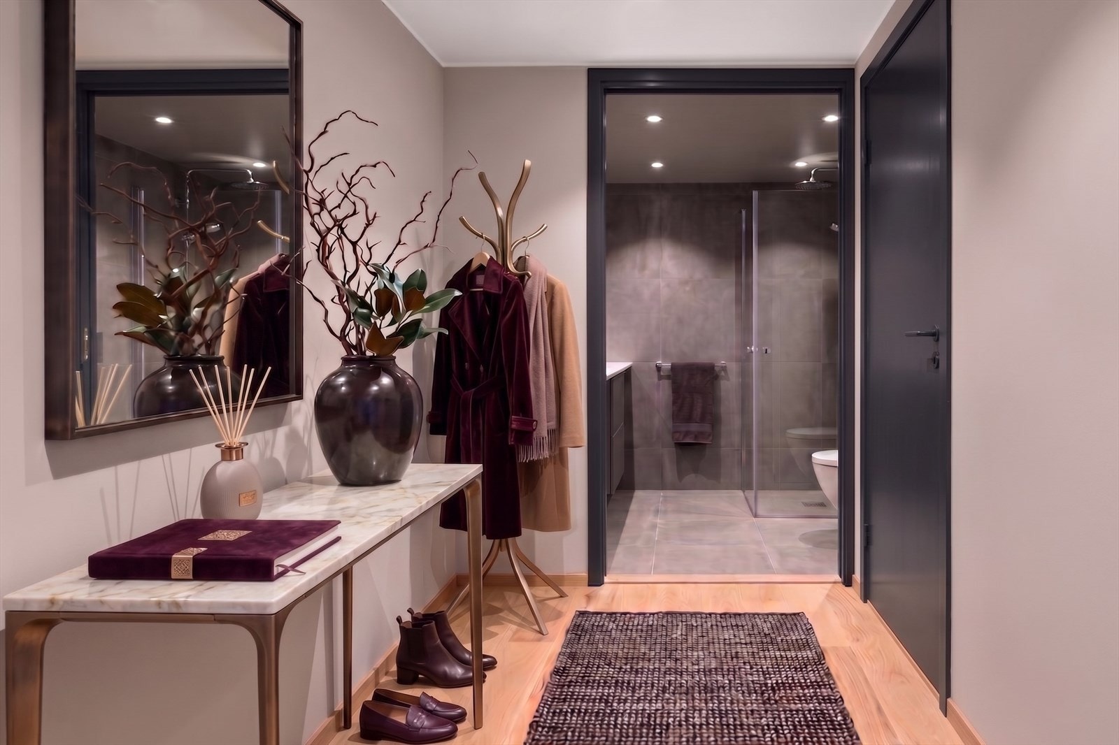 Fin entré m. plass til garderobe, klær og sko. Porttelefon. Bildet redigert/laget m. KI. Avvik vil forekomme. Galleribilde