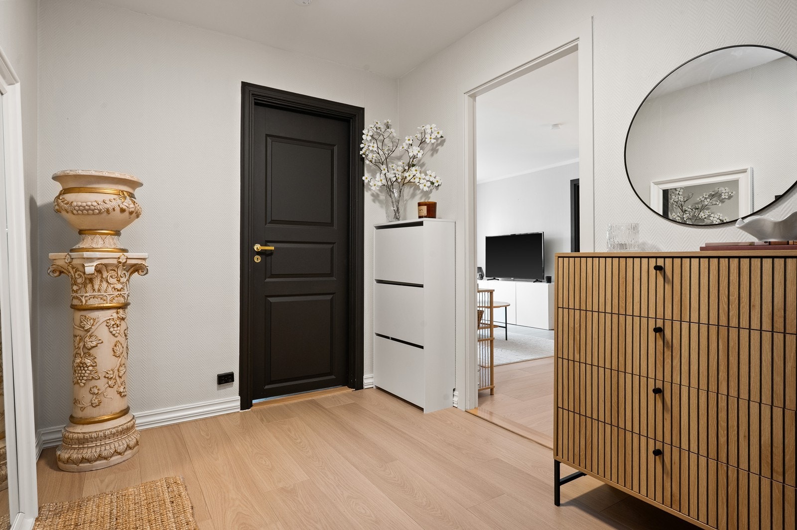 Leiligheten har også en romslig entré. Galleribilde
