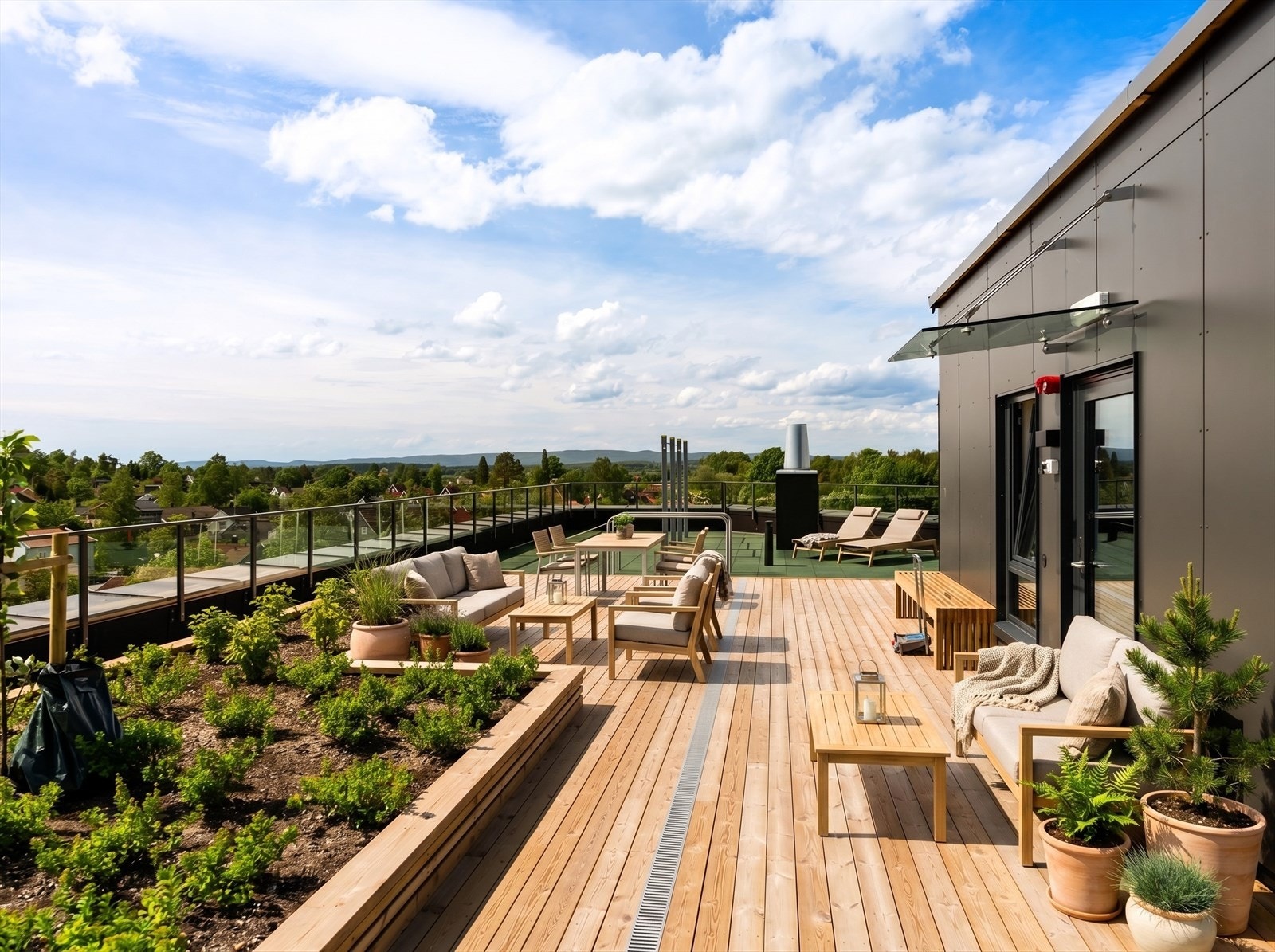 Sameiet har en flott felles takterrasse med glimrende solforhold og flott utsikt (bildet er digitalt møblert) Galleribilde