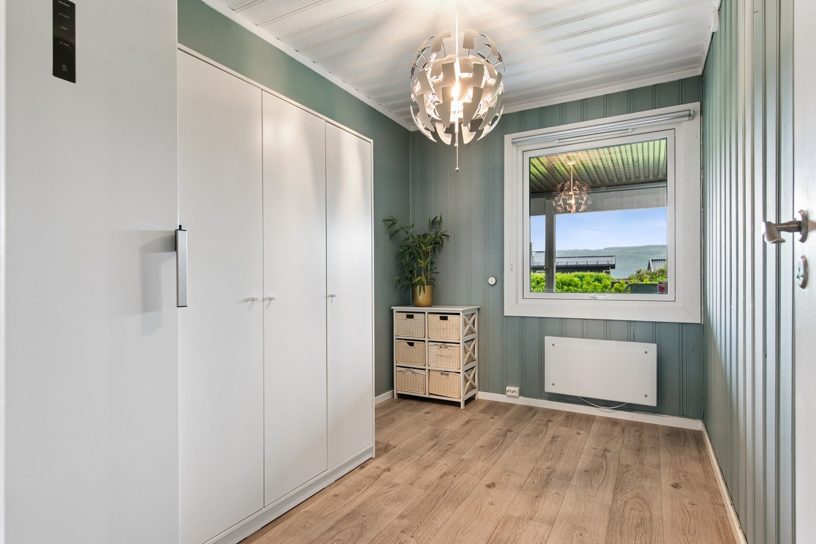 Det tredje soverommet ligger også i underetasjen og passer fint som barnerom eller gjesterom. Galleribilde