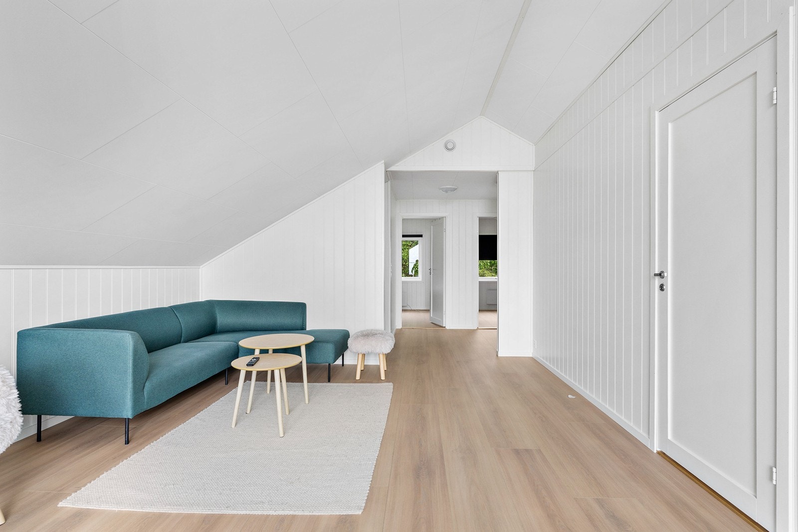 I 3. etasje finner man en større loftstue - perfekt til storfamilien. Galleribilde