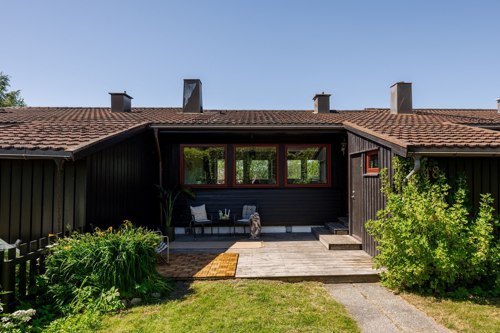 Dette er en lun sitteplass som gir et svært innbydende førsteinntrykk. Galleribilde