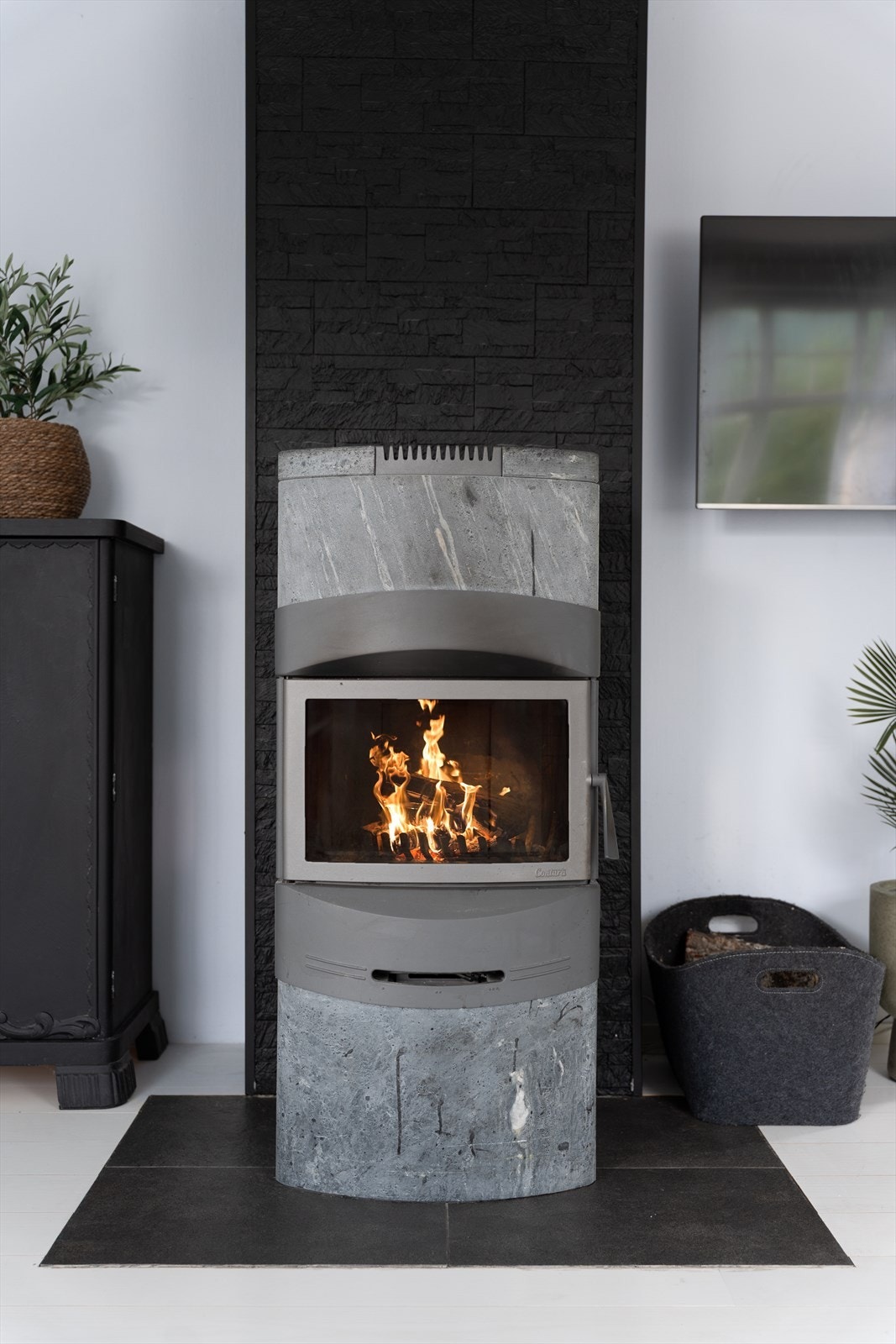 Elegant peis som skaper en lun og hyggelig atmosfære. Galleribilde