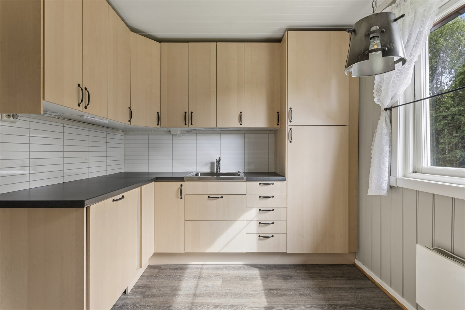 I benkeryggen er det Kitchen Wall, som gjør rengjøringen enklere. Galleribilde