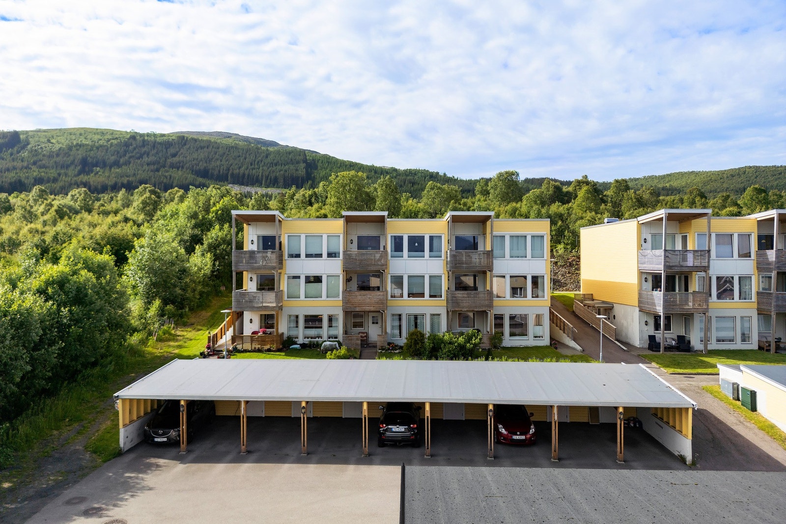 Andelen er tillagt carport og utvendig bod i fellesanlegg Galleribilde