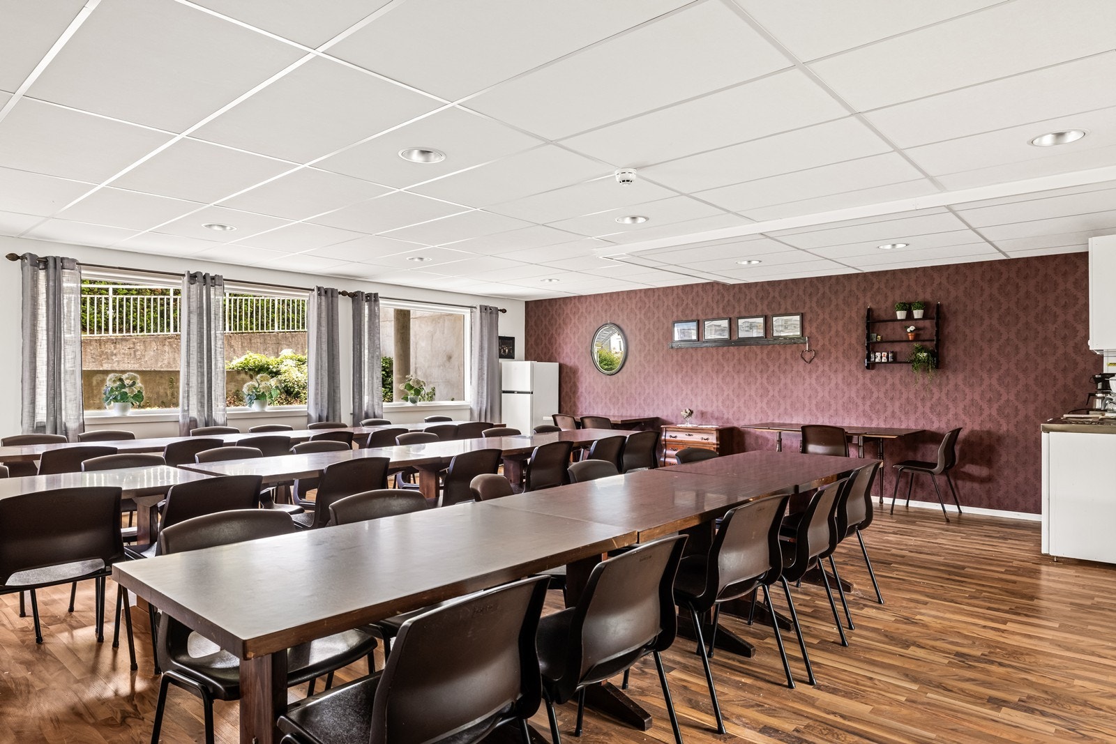 Beboerne har tilgang til et fellesrom for sosiale sammenkomster. Galleribilde