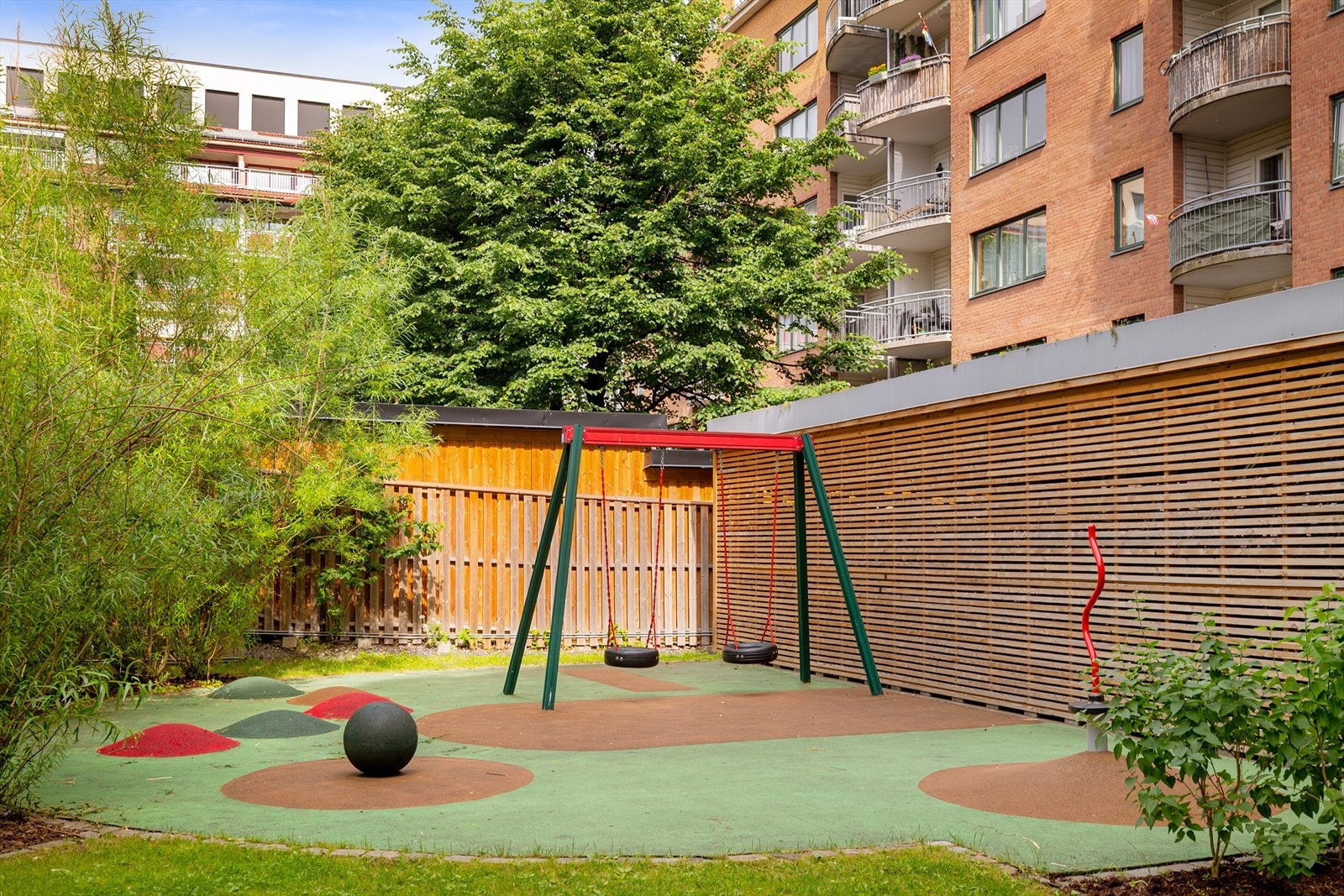 Det er også felles lekeplass for de minste. Galleribilde
