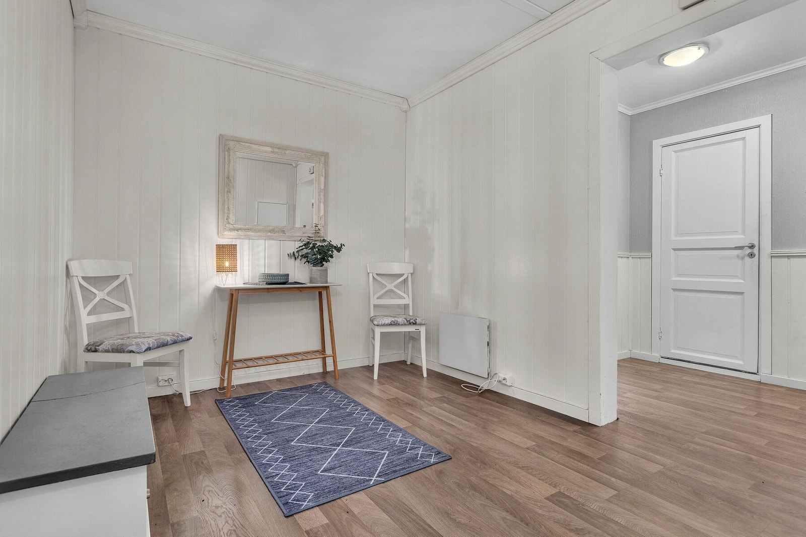Mellomgangen fungerer som et bindeledd mellom soverommene og oppholdsrommene. Galleribilde