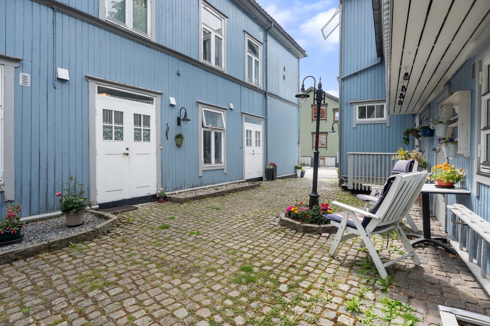 Bakgården er skjermet og gir en nostalgisk følelse. Galleribilde