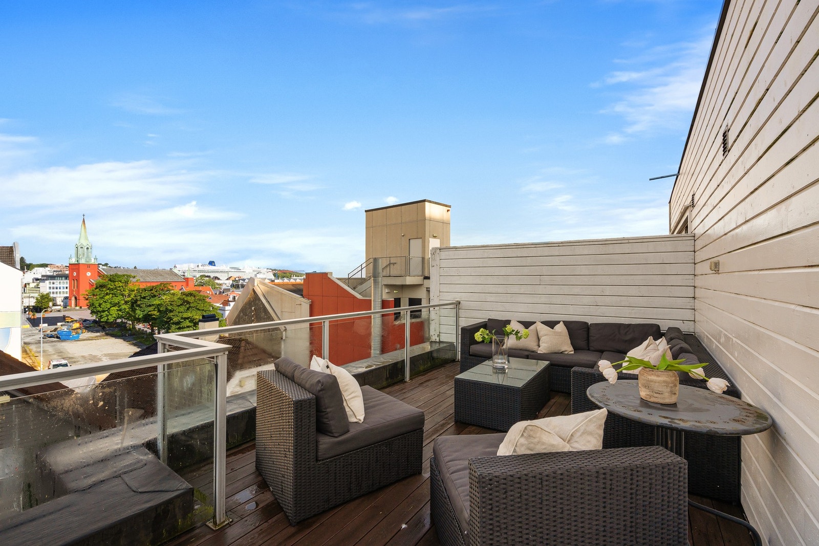 Sameiet har en felles terrasse hvor man kan nyte morgensolen. Galleribilde