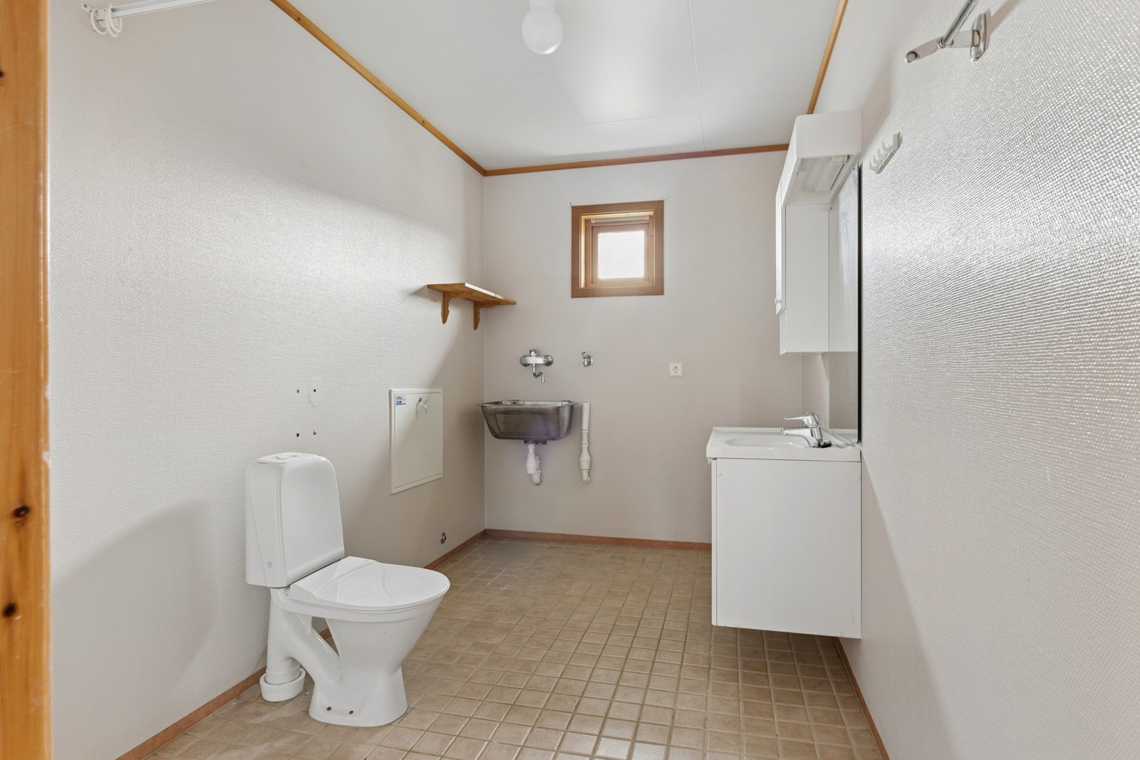 Badet har opplegg for vaskemaskin. Galleribilde