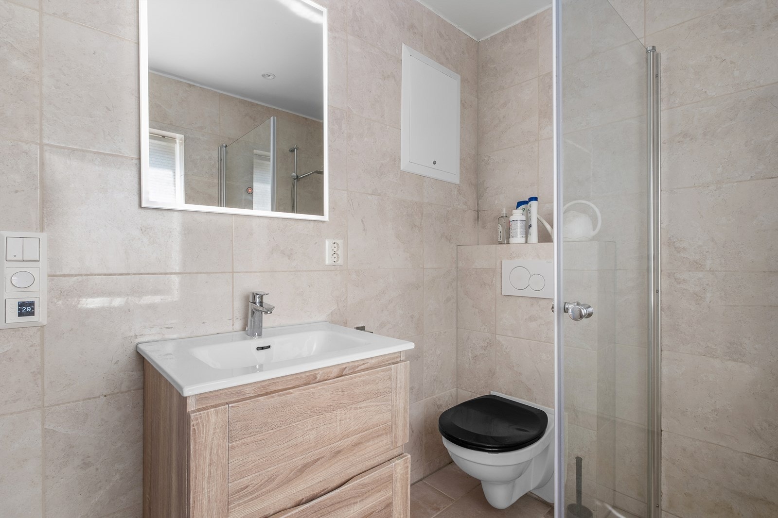 Det flislagte badet i 1. etasje måler 5m². Galleribilde