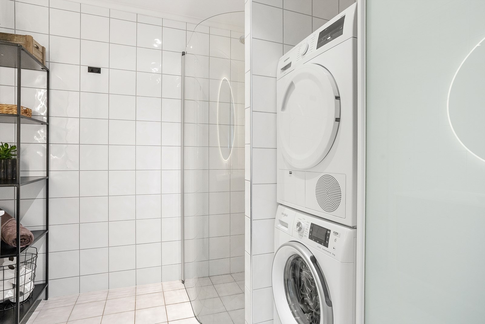 Badet har opplegg for vaskemaskin. Galleribilde