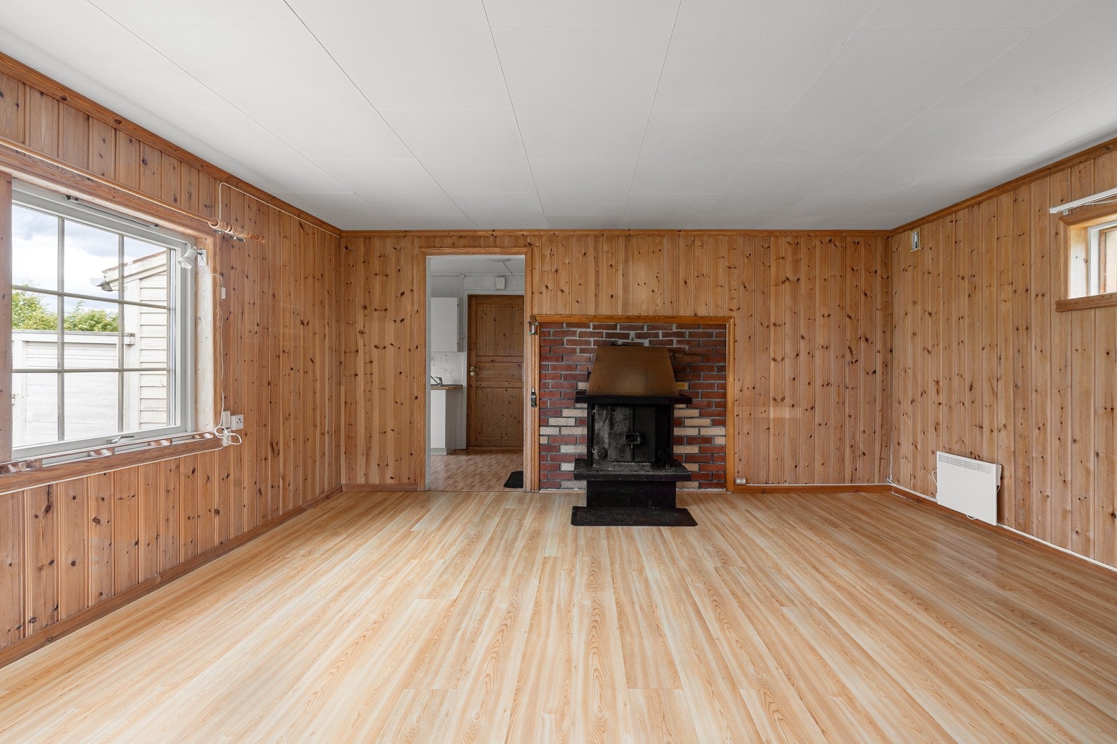 Lun peis i stua gir både hygge og reduserte energikostnader.