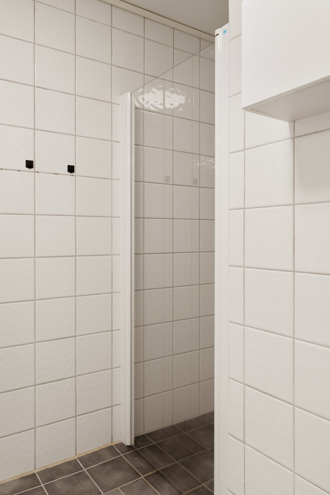 Dusjhjørne med innfellbar glassvegg. Galleribilde