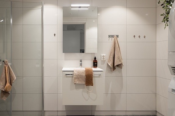Badet har opplegg til vaskemaskin. Galleribilde