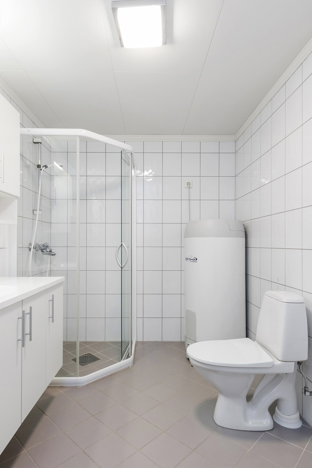 Badet har opplegg til vaskemaskin. Galleribilde