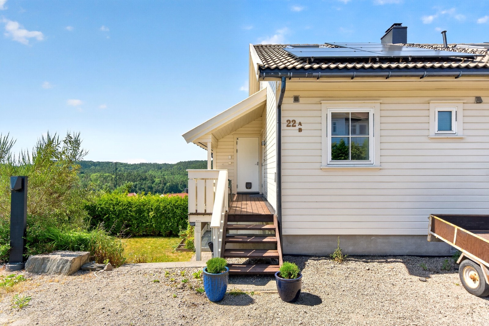 Veranda foran inngangsdør. Bod ses rett fram Galleribilde