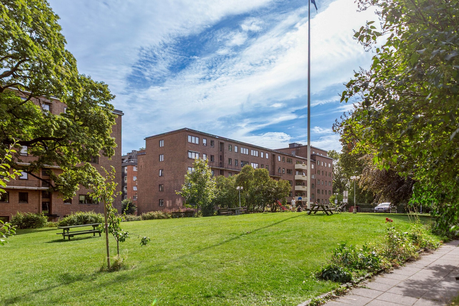 Aksjelaget har fantastiske uteområder - en privat park midt i byen for beboere. Galleribilde