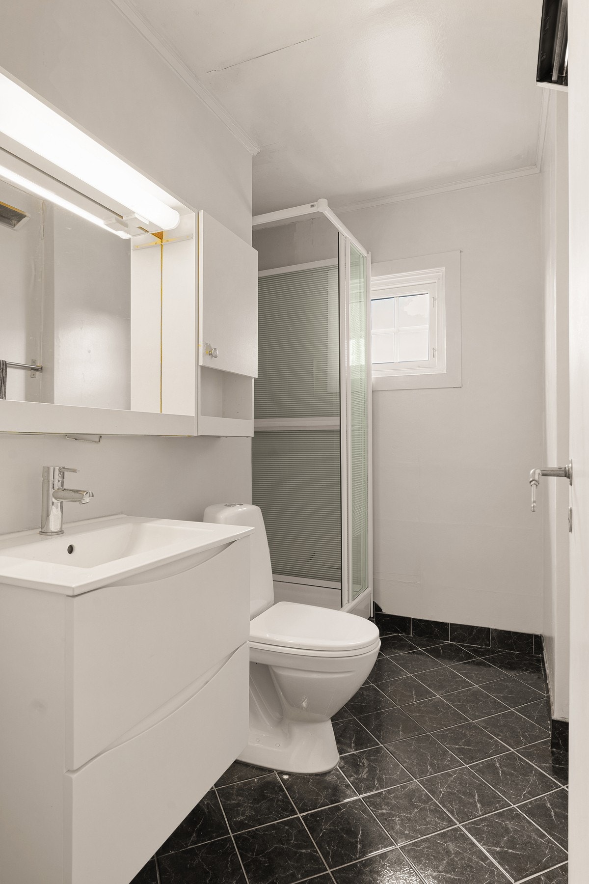 Badet har fått nye fliser på starten av 2000-tallet Galleribilde