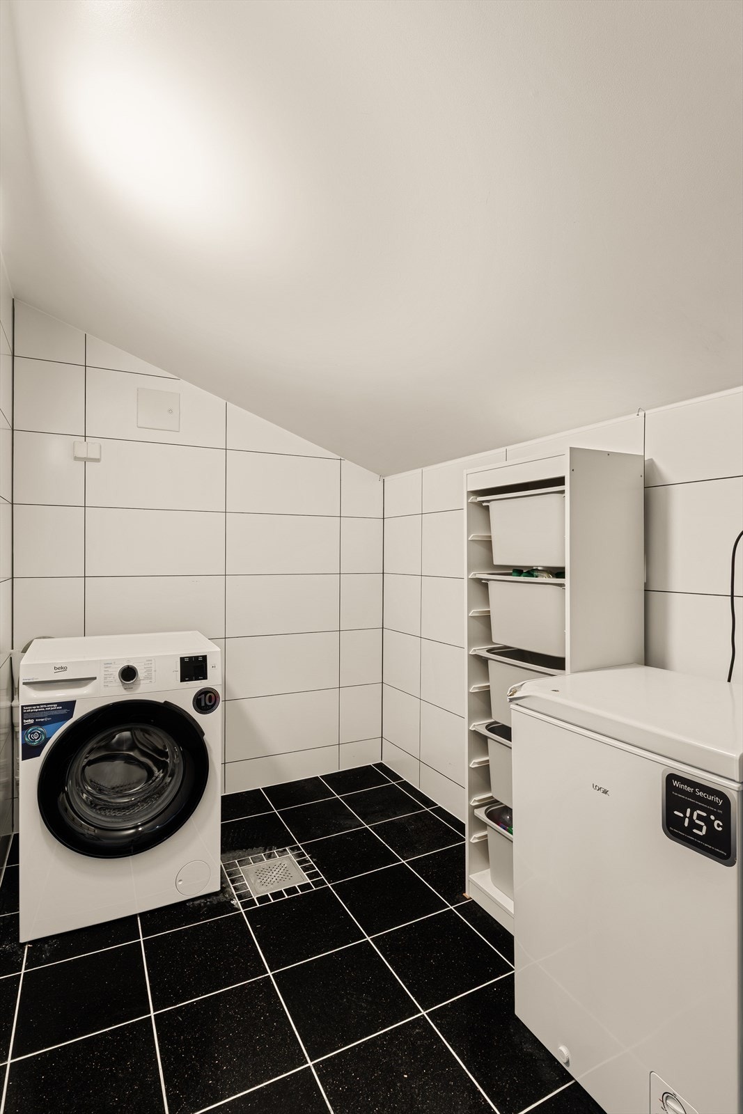 Vaskerommet er pusset opp i lik stil som badet av forrige eier. Galleribilde