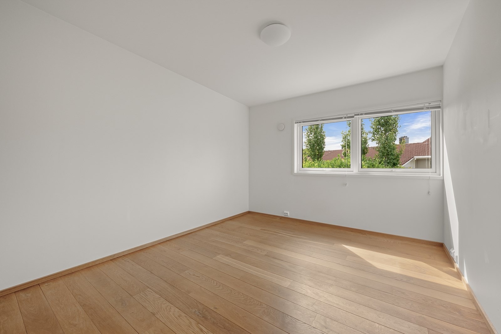 Boligens tredje soverom, ideelt som barnerom, gjesterom eller kontor. Galleribilde