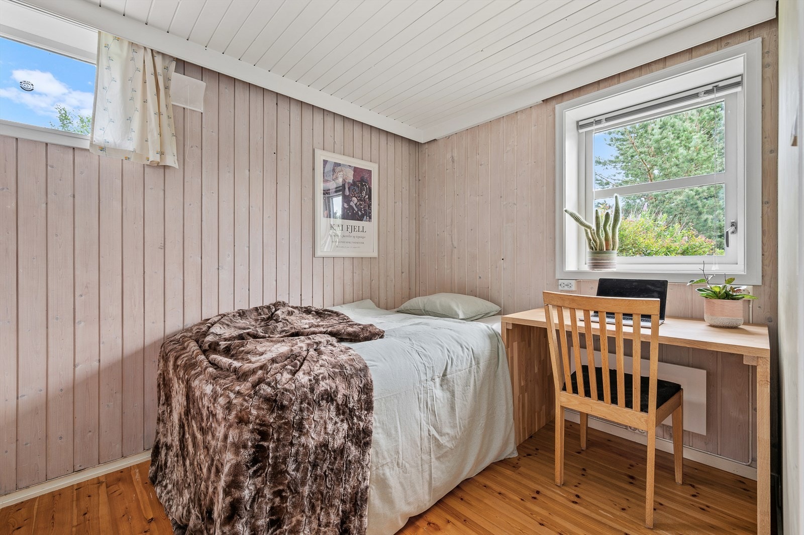 Det første soverommet i kjelleren er på 7,5m². Galleribilde