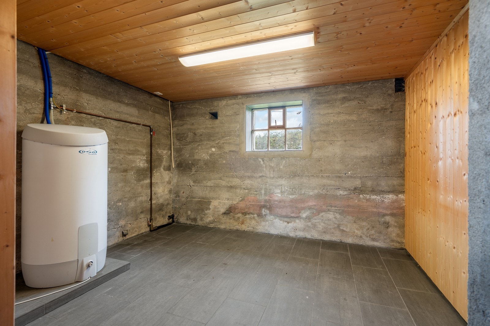 Delvis uinnredet kjellerrom. Galleribilde