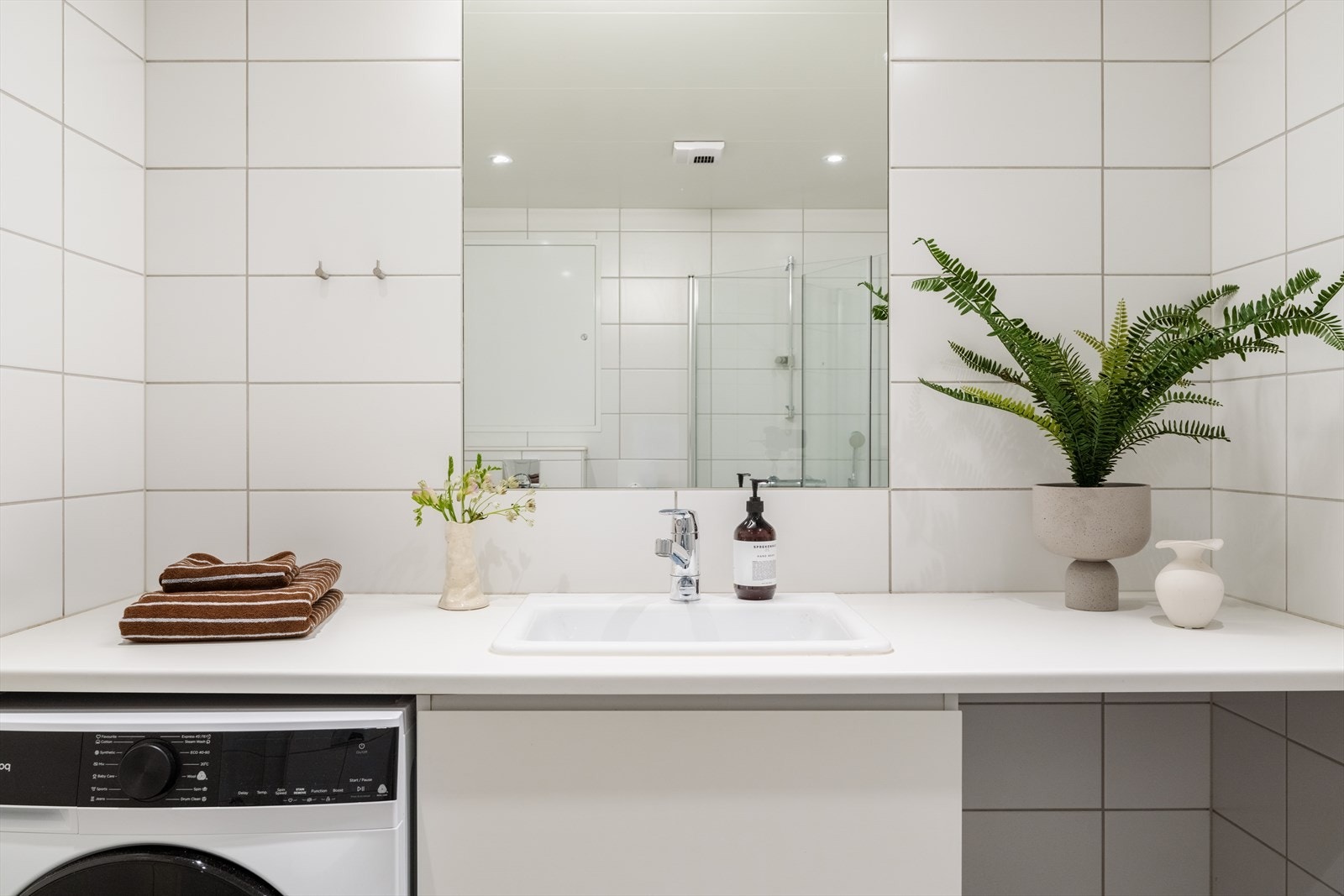 Badet har opplegg for vaskemaskin. Galleribilde