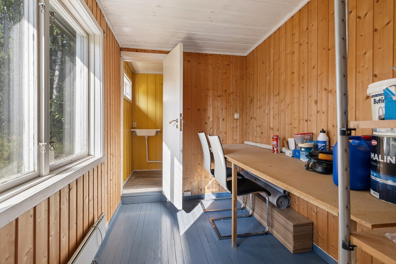 Praktisk rom som i dag benyttes som verksted og gang. Galleribilde
